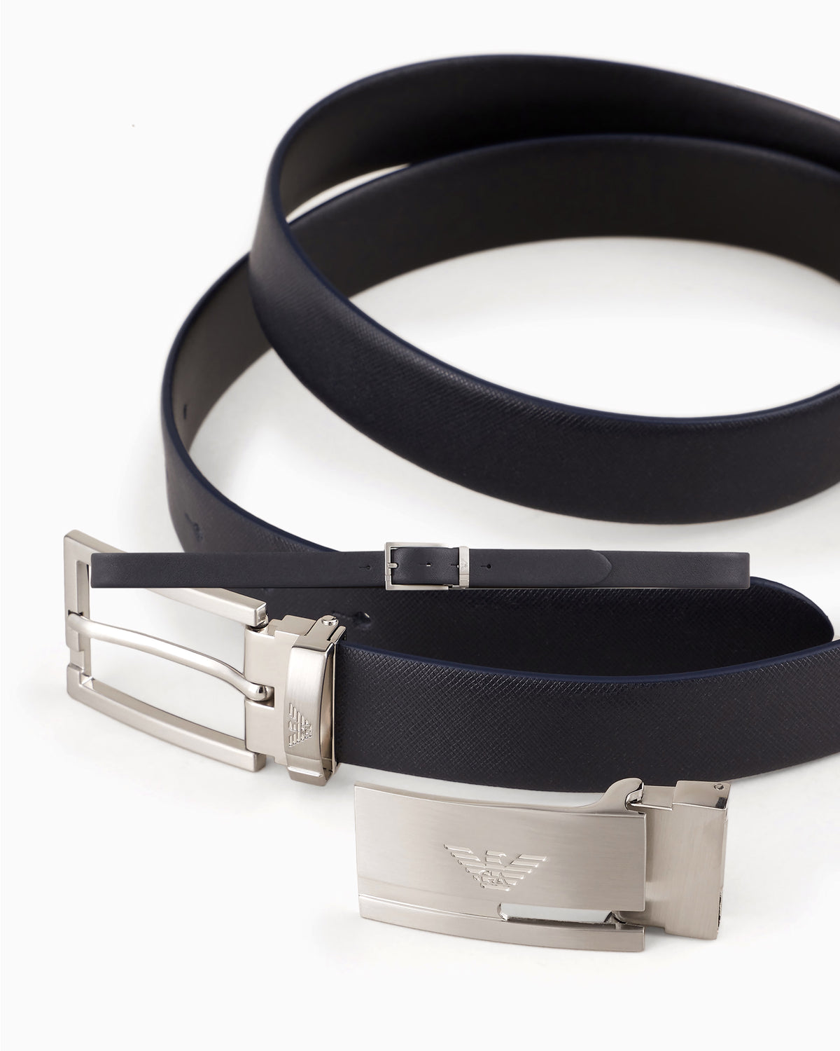 
Reversible two-tone leather belt with all-over embossed eagle – Blue/Black