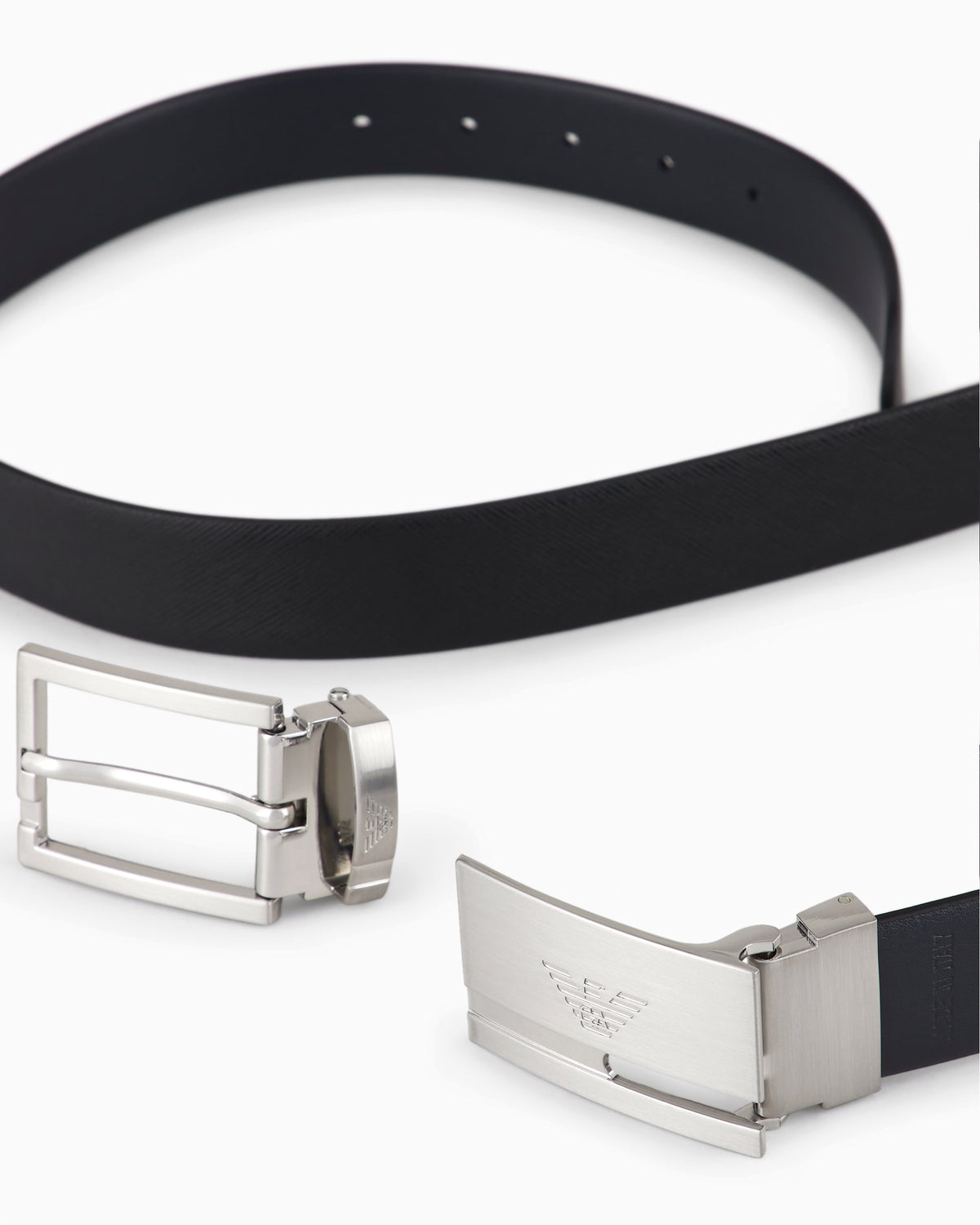 
Reversible two-tone leather belt with all-over embossed eagle – Black/Blue